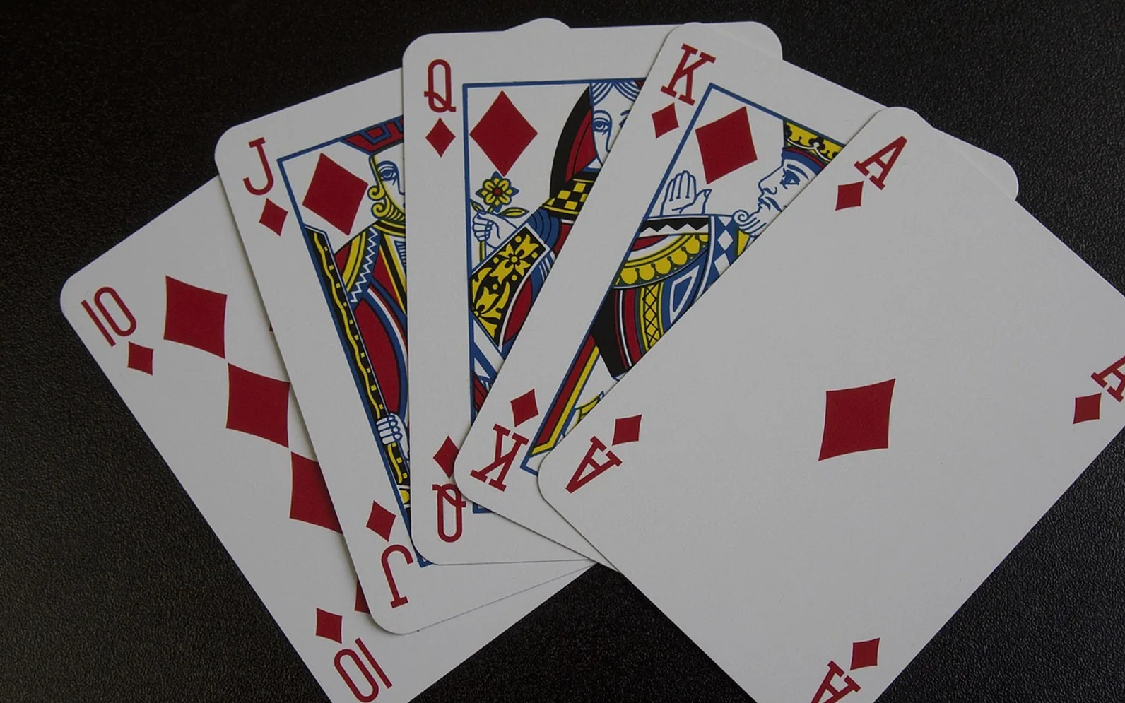Playing cards, royal flush and poker